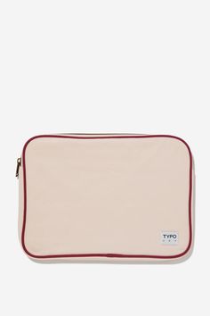 a pink and red pouch with the word'd on it, sitting against a white background