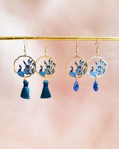 Blue Peacocks with Blue Crystals or Tassels Gold Plated Dangled Drop Earrings, Handmade Earrings, Bird Lover Gift Blue Dangle Earrings With Latkans, Blue Drop Earrings With Latkans, Blue Earrings With Latkans For Gift, Elegant Blue Peacock Design Earrings, Blue Latkan Drop Earrings, Blue Bohemian Jewelry With Peacock Design, Bohemian Blue Jewelry With Peacock Design, Blue Tassel Jewelry Gift, Blue Tasseled Jewelry As Gift