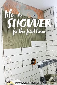 there is a sign that says tile shower for the first time