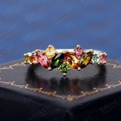 K Solid Gold Ring Kite Shape Natural Tourmaline For Women Wedding Engagement Band Rainbow Gemstone Handmade Cluster Ring ----The Ring Details---- * Gem Stone: Natural Tourmaline * Gem Stone Size: Marquise Cut 2.5*5mm*4pcs  Round Cut 2.5mm*7pcs * Gemstone Total Weight:  Approx 1.08 ct * Material: 10K/14K/18K Solid Gold * Band Width: 1.6 mm * Want to know more details? Please contact me. ----Others Information---- ✦ Guaranteed Purchase: - 14 Day Refund Guarantee; - Excellent Customer Service; - Free Transportation and insurance to All Parts Of The World; - Free Gift Box&Packing ✦It is my honor to design ring for you :) I accept custom making service.Please contact me if you need it.  ✦Please allow 2-3 weeks for manufacturing. Because our rings are all handmade! Need it sooner? Just ask and w Multi Color Stone Ring, Multicolor Jewelry With Accent Stones For Wedding, Multicolor Wedding Jewelry With Accent Stones, Multicolor Gemstones For Wedding Fine Jewelry, Elegant Stackable Gemstones For Wedding, Elegant Stackable Wedding Gemstones, Multicolor Gemstone Birthstone Ring For Wedding, Multicolor Cluster Wedding Ring, Multicolor Cluster Ring With Accent Stones For Wedding