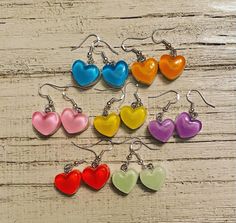 Colorful Gummy Heart Earrings with White Backs. Made with Sterling Silver hooks. Earring Holder, Over The Rainbow, May 11, Heart Earrings, Jewelry Earrings Dangle, Etsy Earrings, Dangle Drop Earrings, Handmade Items, Dangle Earrings