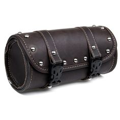 a brown leather case with metal rivets