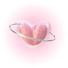 a heart shaped object in the middle of a pink background with a silver ring around it