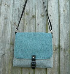 "Gray tweed crossbody bag, teal shoulder bag, gender neutral bag, pocketbook, British wool tweed bag with leather starp and buckle Made from Yorkshire British wool tweed, this bag has lots of structure to create a strong and sturdy bag. It features a large over flap with a leather buckle fastener, a small base gusset to create extra room and a 1\" wide leather adjustable shoulder strap with silver nickel bag hardware. Inside the bag is fully lined in linen and features a large slip pocket and a Blue Bag With Adjustable Strap For Fall, Blue Bags With Adjustable Strap For Fall, Green Leather Trim Crossbody Shoulder Bag, Rectangular Tweed Shoulder Bag For Everyday Use, Rectangular Tweed Shoulder Bag For Everyday, Tweed Satchel Bag For Everyday Use, Everyday Tweed Crossbody Bag, Fall Tweed Shoulder Bag For Everyday, Everyday Tweed Satchel Shoulder Bag