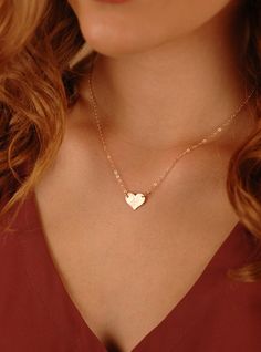 "A beautiful Medium Heart Necklace in Gold-Filled, Sterling Silver, or Rose Gold-Filled. The heart can be personalized with a symbol, single initial, or with 2 tiny letters. Choice of smooth or hammered finish. About the Medium Heart Necklace: - 14K Gold-Filled, Sterling Silver, or 14K Rose Gold-Filled Heart (shown in photo), in 20g thickness - 1.6mm Flat Cable Chain - your choice of length from 14\" - 20\" (Model is wearing about a 17\" chain) - The heart disc measures 11mm x 13mm - Beautifully Rose Gold Heart Pendant Name Necklace As Gift, 14k Gold Filled Heart Charm Jewelry For Wedding, 14k Gold Filled Jewelry For Valentine's Day Wedding, 14k Gold Filled Jewelry For Wedding On Valentine's Day, Wedding Jewelry With 14k Gold-filled Heart Charm, Wedding Jewelry With 14k Gold Filled Heart Charm, Dainty Heart Charm Name Necklace For Anniversary, Rose Gold Heart Pendant Name Necklace, Dainty Rose Gold Jewelry With Heart Charm