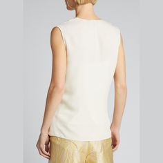 Theory shell with draped-front bodice. Surplice neckline. Sleeveless. Relaxed silhouette. Pullover style. Silk. Unlined. Imported. White Sleeveless Silk Top, Chic Sleeveless Silk Vest, Elegant Evening Tank Vest, Elegant Silk Sleeveless Vest, Spring Event, Surplice Neckline, Bergdorf Goodman, Top Designers, Pullover Styling