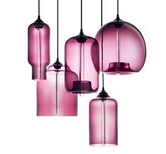 five pink glass lights hanging from the ceiling