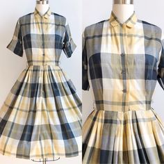 "Moody plaid shirtwaist dress, black and yellow plaid cotton shirtwaist dress. The dress has cuffed short sleeves. The bodice is button up shirtwaist style. Dress has a cute little collat. The skirt is full.  Measurements:  Bust: 36-28\" Waist: 26-27 with moving the snap over\" Hips: full Length: 39.5\" Condition: Good condition, general vintage wear, small spot on sleeve   Material: cotton  Label: unlabelled but have seen the same one labeled Norman Wiatt  ♥ If you have any questions feel free to contact us ♥ Layaway is available for this item  instagram: oldfriendsvintage" Short Sleeve Gingham Plaid Dress For Work, Classic Fitted Plaid Dress With Short Sleeves, Fitted Classic Plaid Dress With Short Sleeves, Summer Plaid Dress With Short Sleeves And Buttons, Gingham Plaid Short Sleeve Dress For Work, Fitted Plaid Dress With Buttons And Short Sleeves, Casual Plaid Dress With Short Sleeves And Buttons, Fitted Plaid Dress With Short Sleeves And Buttons, Plaid Short Sleeve Shirt Dress For Summer