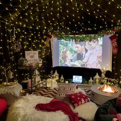 a living room filled with lots of christmas decorations