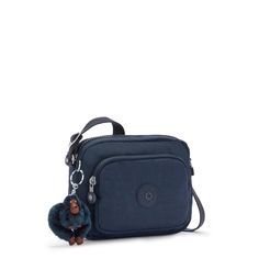 The crossbody bag perfect for your day-to-day or as a travel companion. With multiple organizational pockets, you can keep your essentials organized and close-at-hand. Kipling Wallet, Kipling Backpack, Monkey Keychain, Bags Style, Kipling Bags, Handbag Outlet, Travel Wallets, Shoulder Messenger Bag, Wallet Accessories