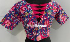 Hot pink Chanderi saree blouse, with beautiful appliqué work done by hand using blue block print cotton fabric. Size : 36 inches Blouse Length: 14.5 inches Sleeves Length: 11 inches There is 2 inches margin inside. Pink Fitted Top For Navratri, Pink Bollywood Blouse With Motifs, Bollywood Style Pink Blouse With Motifs, Pink Cutdana Top For Navratri, Traditional Pink Block Print Blouse, Festive Pink Blouse Piece With Block Print, Party Cotton Saree Blouse Piece, Festive Pink Block Print Blouse Piece, Bollywood Style Pink Blouse For Summer