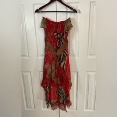 Women’s Large Sleeveless Summer Dress Elastic Waist And Chest Red And Leopard Print Lined Rayon With A Very Giving Nylon Lining Front Skirt 19 Inches Back Of Skirt 36 Inches New With Tags No Flaws Smoke And Synthetic Fragrance Free Home Fitted Red Strapless Dress For Beach, Red Strapless Summer Maxi Dress, Red Strapless Maxi Dress For Summer, Strapless Red Maxi Dress For Vacation, Red Strapless Sundress, Red Sleeveless Bohemian Midi Dress, Red Bohemian Sleeveless Midi Dress, Red Sleeveless Midi Dress For Vacation, Red Bohemian Strapless Dress