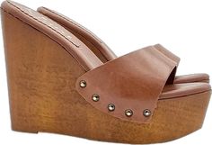 Brown Wedge Heel Sandals With Wooden Heel, Brown Leather Wedge Sandals With Wooden Heel, Brown Wedge Sandals With Wooden Heel, Brown Platform Wedge Heel Mules, Brown Wedge Heel Mules With Deep Heel Cup, Brown Wooden Platform Clogs, Brown Wooden Sandals, Brown Wedge Heels With Wooden Heel, Brown Platform Mules For Beach