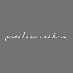 the words positive vibes written in white on a gray background