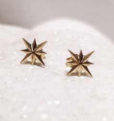 Elegant dainty solid 14k yellow gold north star stud earrings. A minimal yet impressive pair of earrings, ideal to be worn all day. Perfect for a gift or just the ideal reason to spoil yourself! North Star Earrings, 14k Solid Gold, Dainty Polar Post Earrings, Minimalist Star studs, Cute Gift For Her, Polar Star Gift Earrings, Valentine gift for her. Product info * solid 14k yellow gold * 10mm width * handmade 14k gold * Finish: polished. Available in matte finish upon request Custom orders Custo North Star Earrings Studs, Polar Star, Cute Gifts For Her, Minimalist Studs, Star Earrings Stud, Star Gift, Earrings Minimalist, Valentines Gifts For Her, Star Studs