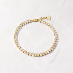 "Marquise shaped stones adorn this beautiful tennis bracelet! Such a classic and stunning piece that is great for stacking, dressing up, or simply on its own! - - - D E T A I L S - - - ▪︎ We use a Thick plating of 14k Gold or Rhodium over brass - for a piece that will be with you for years to come! ▪︎ Available in Sizes: 6.25\", 6.75\" or 7\" + .5\" Ext ▪︎ Stones measure at about 5mm ▪︎ Lobster Clasp Closure ▪︎ Nickel-free, lead free and hypoallergenic ▪︎ Highest Grade CZ for an authentic diamond look  BRACELETS ON MODEL: Chain Bracelet https://www.etsy.com/listing/1388390032/gold-bracelet-chain-bracelet-dainty?click_key=65f0211ef9e4432039629fae99d5170de87ae4c3%3A1388390032&click_sum=7ded955e&ref=shop_home_active_27&pro=1&sts=1 Emerald Bracelet https://www.etsy.com/listing/1378266370/emera Tennis Bracelet Gold, Gold Tennis Bracelet, Bracelet For Her, Daily Wear Jewellery, Bracelet Tennis, Bracelet Diamond, Emerald Bracelet, Gold Armband, White Bracelets