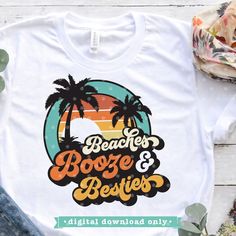 a white t - shirt with the words beach booze and besties on it