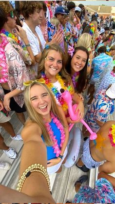 a group of young women standing next to each other