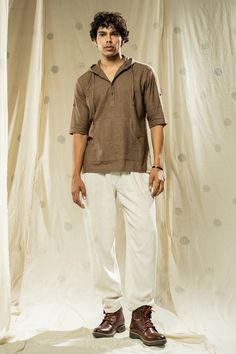 DESCRIPTION  Designed And Crafted By THREAD GAME, Using Natural Hand Woven Softest Charkha Fabric. Stand out from the crowd in the stylish Hand Woven - Hand Spun Half Sleeve Organic Hooded Men Kurta. This unique kurta is made from organic cotton that's hand spun and hand woven for superior comfort and quality. * Ethically made from 100% organic fabric, hand spun and hand woven * Half sleeves allow breathability while the hood adds a fashionable touch * Available in a stunning bronze colour that Bronze Colour, Men Kurta, Organic Fabric, Aging Beautifully, Organic Fabrics, Style Expert, Hand Spinning, Ethical Fashion, Half Sleeve