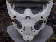 the helmet is white with gold details on it's face and headgear