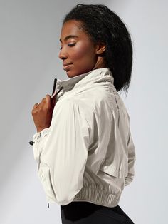 FINAL SALE - NO RETURNS, REFUNDS or EXCHANGES New Cropped Windbreaker makes your activewear wardrobe complete! This jacket is ideal to throw on and go! It’s a lightweight, modern piece that looks great while it protects you from cold breezes and spring showers. • Cinchable collar and wrist bands can keep you warmer, or let you cool down • Waterproof material with mesh lining helps you stay comfortable and dry • Convenient zip-up pockets keep belongings secure • Folds up into its little left pock Cropped Windbreaker, Spring Showers, Spring Shower, Poly Mailer, Poly Mailers, Personal Marketing, Laundry Bag, Zip Up, Final Sale