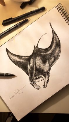 a drawing of a bull's head on a piece of paper