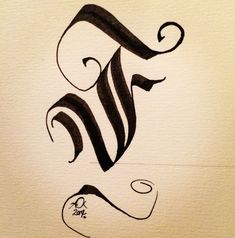 an artistic calligraphy type is shown in black ink