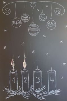 chalk drawing of candles and ornaments on a blackboard