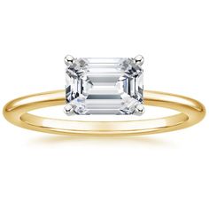 an emerald cut diamond engagement ring in rose gold