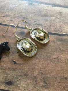 How can one not have these awesome cowboy hat earrings in their collection!? Fun to wear. Great gift idea. Gift boxed Thanks for stopping by - please see my shop for more genuine southwest designer jewelry! https://www.etsy.com/shop/ManyBeadsOfSedona Adjustable Western Style Summer Jewelry, Western Style Gold Jewelry For Country Events, Western Concho Jewelry, Handmade Western Jewelry For Rodeo, Western Style Earrings For Gifts, Western Style Jewelry For Summer Gift, Western Style Summer Jewelry As A Gift, Western Style Summer Jewelry For Gift, Western Style Dangle Earrings For Pierced Ears