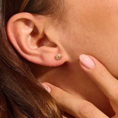 Elevate your style with our Sun Stud Earrings. This delicate piece captures the essence of the sun in a beautifully understated design. The dainty sun design radiates positivity and warmth. Its minimalist aesthetic makes it a versatile accessory that complements any outfit. Embrace the sun's energy and add a touch of elegance to your everyday look. - Made in 14k solid gold - Earring width, 5.70 mm / 0.224 inches- Thickness, 1.93 mm / inches -This product comes with iconic Norm Jewels gift box Sun Earrings Aesthetic, Earrings Aesthetic, Mangalsutra Designs, Sun Designs, Gold Sun, Solid Gold Earrings, Dainty Earrings, Gold Studs, Jewelry Earrings Studs