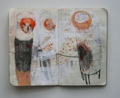 an art journal with drawings on the pages