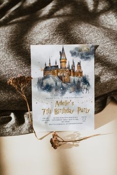 a harry potter birthday party with a hogwart's castle card on the table