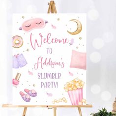 a welcome sign for someone's summer party on an easel next to a potted plant