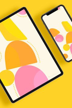 two cell phones sitting next to each other on a yellow surface with an orange and pink background