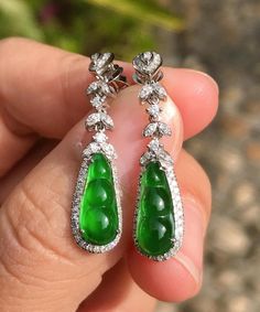 Add an exclusive touch of elegance to your outfit with these Unique Green Sterling Silver Inlaid Zircon Jade Peanut Drop Earrings. Crafted with premium sterling silver and adorned with stunning green jade and sparkling zircon, these earrings are a statement piece of timeless beauty. Elevate your style with luxury. Measurement: 5.5cm/2.145" * 1cm/0.39". Matches easily with daily hairstyle. dresses & Shirts Fine Jewelry Green Drop Earrings, Green Fine Jewelry Drop Earrings, Green Cubic Zirconia Drop Earrings, Fine Jewelry Green Diamond Earrings, Green Cubic Zirconia Fine Jewelry Earrings, Green Cubic Zirconia Earrings Fine Jewelry, Green Cubic Zirconia Hand Set Earrings, Green Cubic Zirconia Gemstone Earrings, Green Diamond Earrings With Sparkling Stones