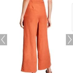 Sancia "Carroca" Linen-Blend Pants. Approx. Measurements: 14" Rise; 26.5" Inseam; 23" Leg Opening. High-Rise. Side Slip Pockets. Wide Legs. Ankle-Length. Button/Zip Fly; Belt Loops. Linen/Rayon/Cotton. Imported. Size Guides Anthropologie Reformation Madewell Free People Chic Mid-rise Bottoms For Vacation, Fitted Mid-rise Bottoms For Vacation, Casual Mid-rise Orange Bottoms, Chic Orange Pants For Vacation, Spring Mid-rise Linen Pants, Fitted Linen Pants For Vacation, Chic Orange Bottoms For Spring, Summer Linen Mid-rise Bottoms, Mid-rise Linen Bottoms For Summer