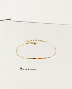 Flag of Romania bracelet. Motherland flag jewelry. Gift for the friend from Romania. Country of origins bracelet.   This listing is for one bracelet. The 1st image shows the bracelet with the flag of ROMANIA. Bracelets with the flag colors of many countries, territories, regions, cities, universities, colleges, parties, communities, etc. are also available. Please ask us if this is possible before ordering. The chain, spacer beads and closure are available in gold tone (default) or silver tone ( Flag Of Romania, Romanian Flag, Romania Flag, Flag Bracelet, Custom Flags, Flag Colors, Gift For Women, Bracelet Gift, Spacer Beads