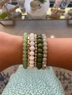 The green stack as seen on our Instagram story!! Perfect for any occasion! Kelly Green Sparklie Gold Barrel Bracelet Cream Fossil Bracelet (#305) 14k Gold Bracelet (#737) Avocado Green Wood Bracelet Mystic Cream Sparklie Jewelry 101, Fossil Bracelet, Wood Bracelet, Green Wood, Avocado Green, Kelly Green, Bracelet Stack, Green And Gold, Fossil