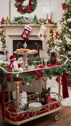 a gold serving cart with christmas decorations on it