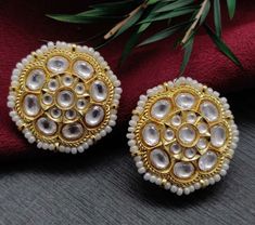 Golden Kundan Pearl Studs / Jadau Kundan Stud earrings/ Rajwadi Pacchi Kundan Earrings/ Kundan Bridal Wedding Jewelry/ Pearl Studs @AryaFashions Traditional Rajwadi Kundan Pearl Stud Earrings  Made in Brass with 22 karat gold plating, very high quality Kundan stones and pearls in a Jadau style Handcrafted To Perfection Light Weight Stud Earrings Perfect For Indian Weddings And Celebrations A Beautiful & Memorable Gift for Weddings and Special Occasions 22k gold plated jewelry Size approx. 1.25 i Festive White Cutdana Bridal Earrings, White Kundan Bridal Earrings With Cutdana, White Kundan Bridal Earrings For Diwali, White Kundan Bridal Earrings For Festive Occasions, Diwali White Kundan Bridal Earrings, White Cutdana Earrings For Festive Occasions, Bollywood Style White Bridal Earrings With Gota Work, Bollywood Style White Kundan Bridal Earrings, Festive White Cutdana Earrings