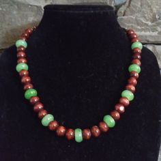 ***Clearance Sale*** Was $28, Now $17 Completely Hand Crafted Necklace! Approximately 21" Length (End To End) Lobster Claw Clasp For Closure. Luxurious Hue Of Green Jade Beads! Burgundy Dyed Wood Beads Give Great Contrast To The Green Jade Beads! Wood Beads Were Each Hand-Picked To Get The Best. Real Reclaimed Wood Beads With A Charming Quality. Stainless Steel Filigree Accents Adorn The End Of The Beads. Necklace Cord Is 100% Leather! Unique Necklace That Stands Out And Really Draws Attention! Cork Necklace, Butterfly Necklace Gold, Braided Necklace, Necklace Cord, Wood Bead Necklace, Gemstone Beaded Necklace, Tree Of Life Necklace, Gold Heart Necklace, Silver Heart Necklace