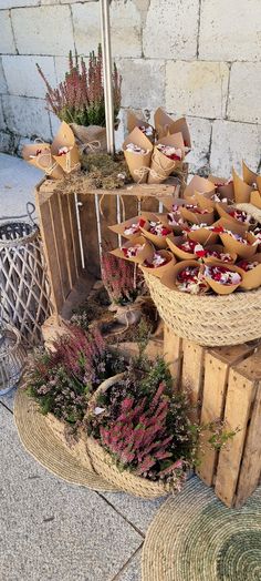 baskets filled with cupcakes sitting on top of wooden crates