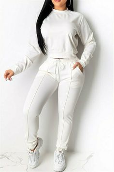 Trendy Cotton Tracksuit With Drawstring, Casual Solid Sets With Pockets, Stretch Cotton Tracksuit With Pockets, Cotton Stretch Tracksuit With Pockets, Sporty Cotton Set With Pockets, Sporty Cotton Sets With Pockets, Casual Stretch White Sets, Casual White Two-piece Set Top, Casual White Stretch Sets