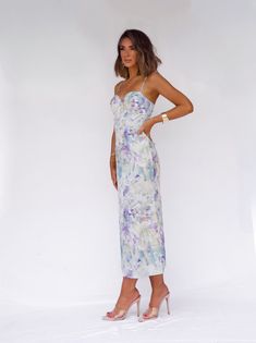 The Mystic Floral Dream Dress features a fitted design and a vibrant multi-colored pattern. Perfect for any occasion, the maxi length adds a touch of elegance while the bustier detail provides a flattering fit. Elevate your style with this stunning and versatile dress. Fabric 100% polyester Lining 97% polyester, 3% spandex Versatile Dresses, New Tops, Matching Sets, Dream Dress, Dress Collection, American Girl, New Dress, Nice Dresses, Rompers