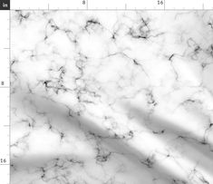 a white and black marble textured background with the measurements for each piece of paper