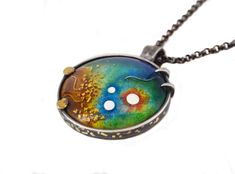 One of a kind vitreous enamel jewel from my Galaxy collection, with 24k gold and fine silver cloisonne and textural 24k gold stardust on a domed fine silver base set into oxidized sterling silver mount with fused 24k gold decoration, with 22" black steel rolo chain with sterling silver hook clasp, bale will accept most of the silver and gold chains you have in your collection, both would look great!*please contact me for more details or photos Vitreous Enamel, Hook Clasp, Cloisonne Enamel, Rolo Chain, Gold Decor, Oxidized Sterling Silver, Stardust, Black Steel, Fine Silver