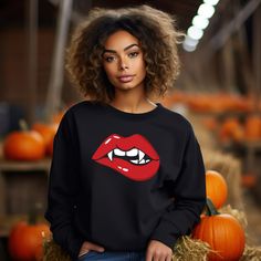 Halloween Shirt for Woman, Halloween Party Costume, Vampire Lips Shirt, Halloween Gift Tee, Funny Halloween Shirt, Lips Shirt, Vampire Shirt ~~ Please check all color and size charts before place the order. Since all shirts are custom made based on your selection, I don't accept return or exchange unless there is an issue with your order. ~~ High quality and super soft, comfortable shirt. Made with top-of-the-line vinyl and pressed with a professional grade heat press. ~~ Processing time is 1-3 Halloween Cosplay Long Sleeve Tops, Gothic Long Sleeve Halloween Tops, Gothic Long Sleeve Tops For Halloween, Halloween Long Sleeve Emo Tops, Emo Long Sleeve Halloween Tops, Gothic Top For Costume Party In Fall, Gothic Tops For Costume Party In Fall, Punk Halloween Cosplay Tops, Punk Tops For Halloween Cosplay