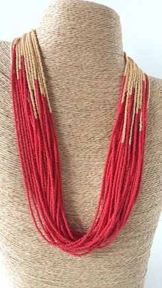 Red and gold necklace red statement by StephanieMartinCo on Etsy Bohemian Red Necklace With Gold Beads, Red Multi-strand Necklace For Festive Occasions, Red Necklaces With Large Beads, Red Multi-strand Beaded Necklace For Festive Occasions, Elegant Hand-strung Red Beaded Necklaces, Festive Red Multi-strand Beaded Necklace, Red Hand-strung Beaded Necklace, Unique Red Necklace With Large Beads, Red Multi-strand Dangling Beads