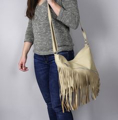 LEATHER BOHO BAG FRINGE LEATHER BAG Soft zippered leather bag. This Handbag is the perfect size to carry your daily essentials in style! It is made from high quality leather. This leather bag is a perfect everyday bag! There is a lot of space and you can put there everything in your everyday life. * Different colors * Lining * An external pocket on the back * Includes internal pockets for mobile phone and other small items. Dimensions: height: 31 cm (12.2 in) width: 39 cm (15.3 in) strap: max 13 Convertible Tote Bag, Crossbody Leather Bag, Leather Fringe Bag, Leather Laptop Bag, Handbag Leather, Leather Laptop, Leather Messenger Bag, Boho Bag, Daily Essentials